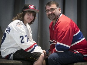 Mark Tucker is seen with his father, Mike, in Montreal on Monday Feb. 5, 2018.