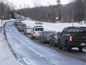 Cars are lined up along Remembrance Rd. on Mount Royal on Tuesday, Feb. 6, 2018.