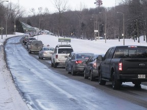 Cars are lined-up along Remembrance Road on Mount Royal on Tuesday February 6. Josh Freed offers some novel suggestions on how to curb traffic without closing the mountain to cars.