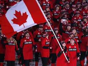 Team Canada enters the Olympic Stadium during the Opening Ceremonies at the Winter Olympics in Pyeongchang, South Korea on Tuesday February 9, 2018. Leah Hennel/Postmedia