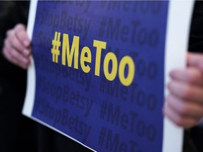 An activist with a #MeToo sign in 2018.