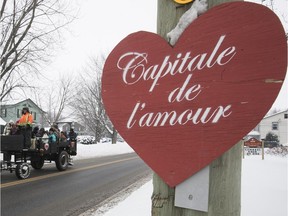 A caleche makes its way down main street in Staint Valentin, Qc on Saturday February 10, 2018. The town calls itself the capital of Love.