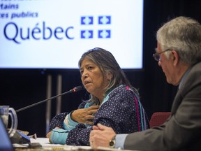 A member of the Mohawk community, Sedalia Kawennotas, and commissioner Jacques Viens at the Viens Commission, a public inquiry into the mistreatment of Indigenous people in Quebec, Feb. 12, 2018.