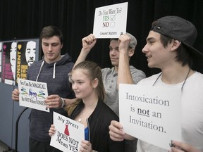 John Abbott College students Louis Blanchard, left, Camille Proulx, Jun Ro and Olivier Larouche, far right, take part in the Consent Matters! event at the CEGEP last week.