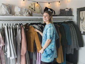 'Lights of All' clothing designer Katia Hagen poses with some her designs at Vivre en Lin clothing store in Hudson.