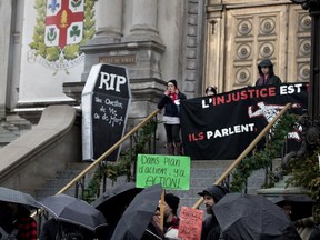 About three dozen people representing drug users and community groups held a demonstration outside city hall on Tuesday to pressure governments into doing more to deal with drug overdoses.