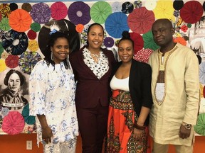 WIBCA head Kemba Mitchell (2nd from right) with guests Donna Blake, Wusua Mitchell and Nicholas Baako during a recent Black History Month eduction themed event.