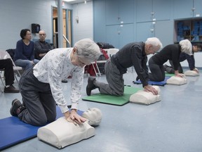 Beverley Shaver (left) and husband Marvin Shaver (centre) perform CPR at the Beaconsfield Recreation Centre on Monday.