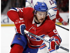 Canadiens' Jonathan Drouin chases the puck in the corner against the New York Rangers in Montreal on Feb. 22, 2018.