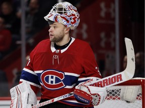 Canadiens goaltender Antti Niemi takes a break during stoppage in action in an NHL game against the New York Rangers at the Bell Centre in Montreal on Feb. 22, 2018.