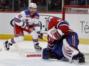 Rangers centre David Desharnais looks for an open man as he is blocked by Canadiens goaltender Antti Niemi Thursday night at the Bell Centre.