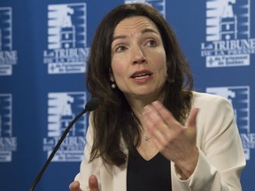 Bloc Quebecois leader Martine Ouellet speaks at a news conference.