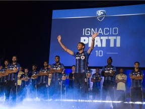 Impact's Ignacio Piatti is introduced with his team to the members' assembly at the Imperial Cinema Wednesday night.