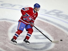 Tomas Plekanec skates past centre ice during warmup before game between the Canadiens and Florida Panthers at the Bell Centre in Montreal on Oct. 24, 2017.