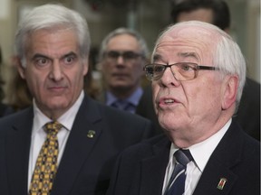 Beaconsfield Mayor Georges Bourelle, right, with Montreal West Mayor Beny Masella: suburban mayors say Montreal's capital works budget does not address their concerns.