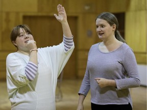 Cicely Austin (left) and Olivia Kearvell-Jobin practice improv at the Red Barn Community Centre in Baie-D'Urfė.