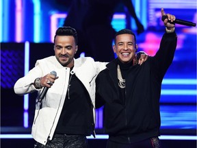 NEW YORK, NY - JANUARY 28:  Recording artists Luis Fonsi (L) and Daddy Yankee perform onstage during the 60th Annual GRAMMY Awards at Madison Square Garden on January 28, 2018 in New York City.