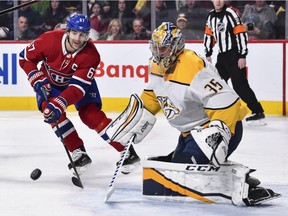 Canadiens captain Max Pacioretty chases rebound left by Nashville Predators goalie Pekka Rinne during game at the Bell Centre in Montreal on Feb. 10, 2018.