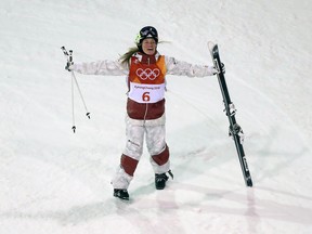 Justine Dufour-Lapointe celebrates her silver medal in women's moguls at the Pyeongchang Olympics on Feb. 11.