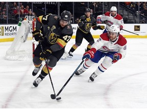 Golden Knights' Luca Sbisa and Canadiens' Jonathan Drouin go after a loose puck iat T-Mobile Arena on Saturday, Feb. 17, 2018, in Las Vegas.