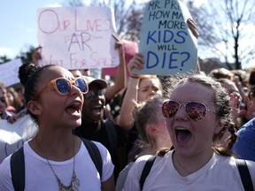 Students participate in a protest against gun violence February 21, 2018 on Capitol Hill in Washington, DC. Hundreds of students from a number of Maryland and DC schools walked out of their classrooms and made a trip to the U.S. Capitol and the White House to call for gun legislation, one week after 17 were killed in the latest mass school shooting at Marjory Stoneman Douglas High School in Parkland, Florida.