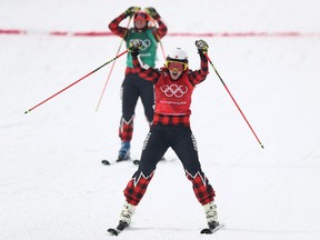 Kelsey Serwa of Canada celebrates winning the gold medal with silver medallist Brittany Phelan of Canada during the Freestyle Skiing Ladies' Ski Cross Big Final on day fourteen of the PyeongChang 2018 Winter Olympic Games at Phoenix Snow Park on February 23, 2018.