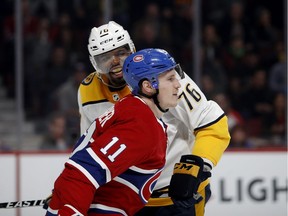 Nashville Predators defenseman P.K. Subban has words with Montreal Canadiens right wing Brendan Gallagher after being driven into the boards by Gallagher during HNL action in Montreal Saturday February 10, 2018.