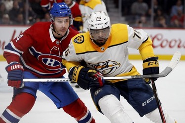 Nashville Predators defenseman P.K. Subban holds back Montreal Canadiens left wing Charles Hudon during HNL action in Montreal Saturday February 10, 2018.
