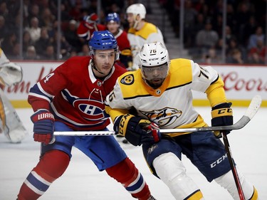 Nashville Predators defenseman P.K. Subban holds back Montreal Canadiens left wing Charles Hudon during HNL action in Montreal Saturday February 10, 2018.