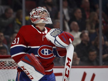 Montreal Canadiens goaltender Carey Price watches a replay on the big screen during HNL action against the Nashville Predators in Montreal Saturday February 10, 2018.