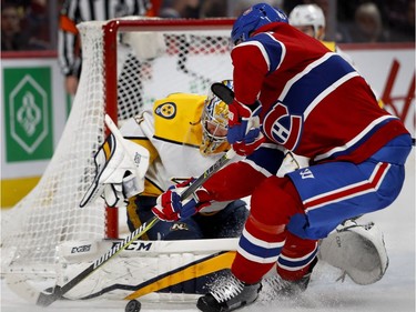Montreal Canadiens right wing Logan Shaw looks for a rebound after Nashville Predators goaltender Pekka Rinne stopped his shot on net during HNL action in Montreal Saturday February 10, 2018.