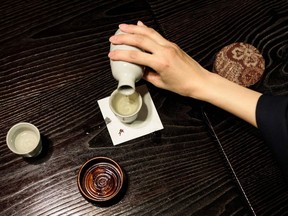 Sake is brewed, so it's more of a rice beer than a rice wine.