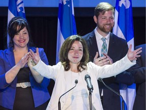 Newly acclaimed Bloc Quebecois leader Martine Ouellet salutes supporters during a rally in 2017. Seven of the 10 Bloc Quebecois MPs quit Wednesday because of her leadership style, leaving the once-powerful party in complete disarray.