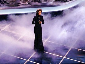 Céline Dion sings the song My Heart Will Go On, the Oscar-winning theme song for the movie Titanic, during the 70th Academy Awards at the Shrine Auditorium 23 March, 1998.  AFP PHOTO   Timothy A. Clary