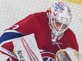 Montreal Canadiens goaltender Antti Niemi makes a save against the Anaheim Ducks during first period NHL hockey action in Montreal, Feb. 3, 2018.