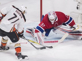 Canadiens goaltender Antti Niemi makes a save against Anaheim Duck' J.T. Brown in Montreal on Saturday, Feb. 3, 2018.