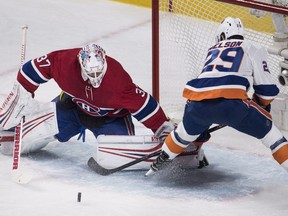 Canadiens goaltender Antti Niemi makes a save against Islanders' Brock Nelson during first period Wednesday night at the Bell Centre.