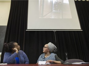 Johanne Coriolan, left, a family member of Pierre Coriolan and activist Maguy Metellus look on during a news conference in Montreal, Wednesday, February 7, 2018. Pierre Coriolan's family announced they are suing the City of Montreal, alleging that police were abusive and used unnecessary force in its efforts to subdue him. The legal action comes following a disturbing video that was given to the family by Coriolan's neighbour that raises questions about the arrest.