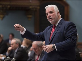Quebec Premier Philippe Couillard responds to the Opposition during question period on Feb. 6, 2018, at the legislature in Quebec City.