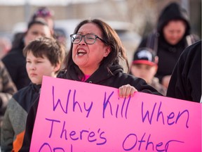 Colten Boushie's mother Debbie Baptiste addresses demonstrators gathered outside of the courthouse in North Battleford, Sask., on Saturday, February 10, 2018.