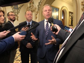 Jean-François Lisée is sporting a new look, including less white hair as well as, not shown here, chic new glasses and shoes.