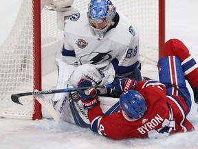 Canadiens forward Paul Byron, seen crashing into Lightning goaltender Andrei Vasilevskiy, will start on Montreal's top line on Saturday.