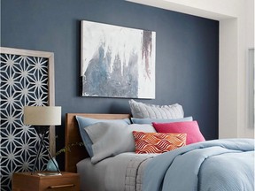 To keep artwork from appearing to float away from the furnishings it hangs above, install it six to eight inches from the top edge of the furniture.