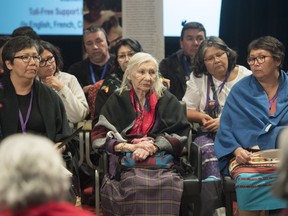 Members of the Atikamekw sharing circle prepare to deliver their testimony during the National Inquiry into Missing and Murdered Indigenous Women and Girls in Montreal, Tuesday, March 13, 2018.