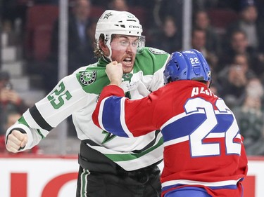 Dallas Stars Brett Ritchie throws a punch during second period fight with Montreal Canadiens Karl Alzner during National Hockey League game in Montreal Tuesday March 13, 2018.