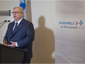 Quebec Health Minister Gaetan Barrette speaks at the Stillview Family Medicine Clinic in Pointe-Claire last Thursday.