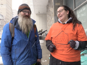 McKenzie Murray (right) shows "Irish" the camp they're sleeping in during 5 Days for the Homeless on Wednesday, March 14, 2018.