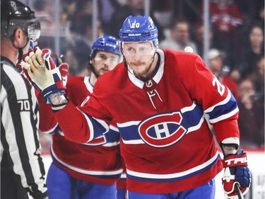 Montreal Canadiens Nicolas Deslauriers gets high-fives from teammates on the bench after scoring goal against the Pittsburgh Penguins during second period of National Hockey League game in Montreal, Thursday March 15, 2018.