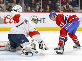 Panthers Roberto Luongo makes a pad save on a between-the-legs shot by Canadiens' Daniel Carr Monday night at the Bell Centre.