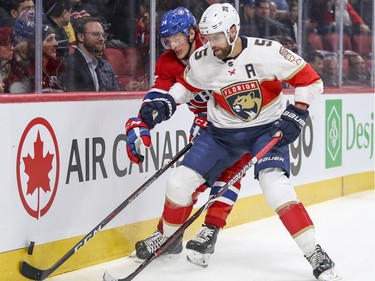Montreal Canadiens Michael McCarron chases Florida Panthers Aaron Ekblad during first period of National Hockey League game in Montreal Monday March 19, 2018.